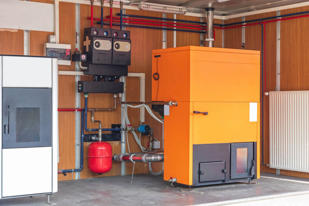 Big Pellet Burning Boiler System in Basement